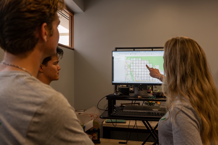 Bri Gilbert and students looking at GIS maps of LA Fire burn areas